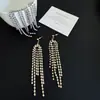 Pendientes largos europeos y americanos de borla de circón con diamantes, diseño de nicho brillante, estilo de fiesta de alta gama, pendientes de lujo ligero para mujer