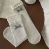 Calcetines de encaje estilo coreano INS para mujer, calcetines dulces de lazo hasta la mitad de la pantorrilla, calcetines largos florales, calcetines holgados de lunares estilo japonés