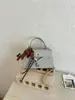 Bolso Pequeño Retro de Alta Gama Transfronterizo Nuevo Bolso de Mano Kelly de Moda para Mujer Bolso de Hombro Cruzado Versátil con Estilo