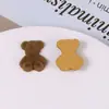 Otoño e Invierno Felpa Dibujos Animados Parche Oso Pardo Aretes Adornos para la Cabeza Horquilla Accesorios DIY Accesorios de Joyería Venta al por Mayor