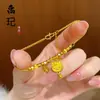 Pulsera de calabaza mariposa oro antiguo de alto color láser tienda de oro con joyería flash nicho lujo cuatro hojas