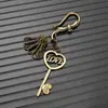 Llavero con Forma de Corazón de Amor, Colgante Metálico Bicolor Dorado y Plateado, Accesorios para Bolsos Estilo Dulce y Genial al por Mayor