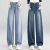 Pantalones de mezclilla con dobladillo curvo, estilo nuevo otoño 2026, pantalones casuales elegantes y que reducen la edad, versátiles, simples, suaves, de color liso, largos