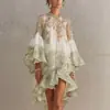 Vestido corto estampado con volantes de marca independiente estilo europeo y americano 2026 para mujer, estilo vacacional, holgado, fluido y moderno