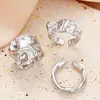 Anillo de estilo frío ins nuevo transfronterizo con textura irregular, juego de 3 piezas, personalidad, nicho, joyería elegante de lujo ligero