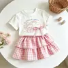 Conjunto de Verão Novo Estilo Coreano para Meninas Estiloso Versátil Desenho Animado Manga Curta Estiloso Doce Xadrez Estilo Coreano Duas Peças Tendência