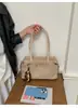 Bolso de gamuza para mujer, nuevo y moderno estilo retro de otoño 2026, adecuado para ir al trabajo, bolso de hombro de gran capacidad