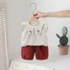 Conjunto de Verão Sem Mangas para Meninas 2026 Novo Estilo Coreano Conjunto de Duas Peças com Colete Floral Fashionável Tendência Atacado
