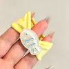 Modernas y coloridas nuevas ligas para el cabello 2026, accesorios versátiles para el cabello inspirados en la dopamina para niños, diademas de alta gama con temática de dulces M&M