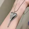 Cadena de Suéter con Forma de Corazón de Línea Simple Retro Collar de Corazón Asimétrico de Plata Cadena para Clavícula Versátil Personalizada Estilo Étnico