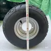 Carrito de playa de cuatro ruedas modificado con neumáticos de carretera de 16x8.00-7 pulgadas, neumáticos de vacío y cubos de rueda
