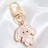 Chaveiro de boneca fofa com orelhas grandes, pingente de liga de desenho animado com gota de óleo, decoração de bolsa, acessório artesanal DIY