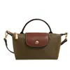 Moda Retro Versátil Transfronteriza Bolso de Mujer Primavera y Verano 2025 Bolso de Mujer Hombro Cruzado Llevado a Mano Nylon de Alta Gama Bolso Dumpling