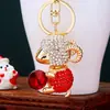 Chaveiro de Ovelhinha Segurando Pedra Preciosa com Strass para Carro Feminino Tendência Nacional Pingente de Bolsa Chaveiro de Metal Presente Criativo Atacado