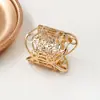 Anillo ovalado de acero inoxidable con diseño de círculo mágico hueco, moda personalizada transfronteriza europea y americana, con apertura ajustable y hebilla para bufanda
