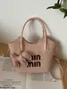 Bolsas de Mujer Transfronterizas 2026 Nueva Moda Tendencia Bolso Cubo de Paja con Letras Versátil Bolso de Hombro y Cruzado para la Playa