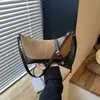 Bolso de hombro ligero de alta gama retro, estilo coreano, transfronterizo, nuevo de otoño 2026, bolso de mano casual versátil