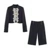 Atacado transfronteiriço 2026 Moda casual europeia e americana conjunto de jaqueta de botões com retalhos de renda + shorts para mulheres B483145/6