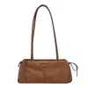 Bolsa de ombro niche estilo francês para mulheres, nova coleção de inverno 2026, bolsa de ombro casual retrô, design de alta qualidade, adequada para o dia a dia, bolsa baguette