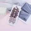 Traje de Lazo Mini Caliente Transfronterizo para Niños Bebé Pinza de Cabello Color Caramelo Europeo y Americano Adorno para la Cabeza Europeo y Americano