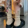 2026 Principios de Primavera Nuevo Estilo Diseño Relajado con Abertura Trasera, Estilo de Diseñador, Moda Retro Artística Japonesa de Nicho de Longitud Media