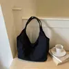 Bolso de mezclilla artístico de nicho estilo coreano 2026 para mujer, gran capacidad, sensación de alta gama, bandolera versátil para mujer, adecuado para ir al trabajo