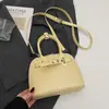Bolsa Transversal Nova Deste Ano Estilo Coreano Fashionável Padrão Trançado Bolsa Concha para Mulheres, Alta Qualidade Estilo Sexy Cor Pura Bolsa Transversal de PU