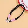 Colgante de juguete de peluche con cordón tejido multicolor, correa de muñeca para teléfono móvil, correa corta de mano con doble hebilla, accesorio de cordón de nailon