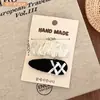 Pinzas para el pelo de tela en blanco y negro estilo coreano, pasadores simples retro para niña, pinzas versátiles de encaje a cuadros para flequillo, accesorios para el cabello al por mayor