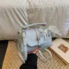 Bolso pequeño retro explosivo de alta gama para mujer 2026 nuevo y moderno estilo coreano elegante bolso cuadrado pequeño de mano bolso cruzado versátil