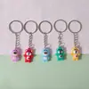 Agujero de spot caja ciega de música muñeca accesorios pequeños huevo Sanrio kulomi dios original llavero pequeño regalo colgante