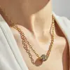 Set de joyería de acero inoxidable estilo lujo transfronterizo europeo y americano con circonita cúbica de colores en forma de esfera, incluyendo un brazalete, un collar y unos pendientes