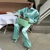 Moda femenina europea y americana transfronteriza AliExpress súper ventas chaqueta de satén brillante de cuello alto + conjunto de pantalones