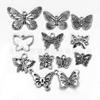 Accesorios de bricolaje de aleación de zinc, 12 colgantes de mariposa multicolor, collar, pulsera, pendientes, accesorios de joyería al por mayor