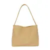 Bolso de axila de nicho de alta gama para mujer 2026 Nuevo Verano Súper Caliente Exquisito Bolso tipo cubo de un solo hombro para axila