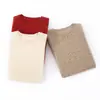 Suéter de Cachemira 100% al por mayor del fabricante, amigable con la piel y cálido, jersey de punto de cuello redondo, suéter de cachemira con diseño calado de manga larga para mujer, en stock