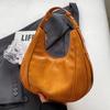 Bolso de gran capacidad bolso de mujer 2023 nuevo diseño nicho de alta gama estilo occidental bolso bandolera retro popular bolso dumpling