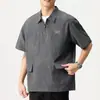 Nova camisa polo de manga curta de seda gelada de secagem rápida para homens, verão 2026, corte solto, tamanho grande, camisa estilosa para o trabalho, camiseta leve