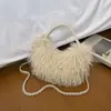 Bolsa de pelúcia para mulheres 2026 novo modelo bolsa de mão com corrente cor sólida personalidade da moda bolsa transversal bolsa de ombro elegante para o dia a dia