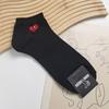 Calcetines casuales de algodón de cintura corta para hombre de Corea del Sur primavera y verano nuevos ojos de amor viento Harajuku malla transpirable mayoreo marca de moda calcetines
