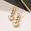 Pendientes de Acero de Titanio Minimalista Corazón con Cadena de Oro de 14K Nuevo Diseño de Alta Gama Modernos Pendientes de Celebridad de Internet para Mujer