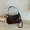 Bolso Femenino para Axila 2026 Nuevo Verano Nicho Alto Lujo Textura Tejida Hombro Único Cruzado Viaje Bolso Cubo