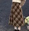 Conjunto de punto de otoño para niñas 2026 nuevo estilo conjunto de dos piezas de polo y suéter para niños mayores