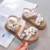 Sapatos de Salto Baixo Femininos 2026 Verão Novo Estilo Coreano Vazados Respiráveis Sandálias Flat Laço Cristal Sapatos de Praia Infantis
