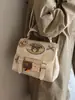 Nova Bolsa Transversal de Urso Estilosa 2026, Mochila de Design de Nicho Versátil e Fashion, Mochila Multifuncional na Moda