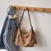 Colección de otoño 2026 transfronteriza: bolso de hombro elegante y de alta calidad, bolso tote retro, moderno y visualmente atractivo, gran capacidad, mochila casual