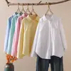 Colección Otoño 2026: Camisa de mujer estilo japonés de tela Oxford a rayas con bolsillos, cuello de punta, manga larga, estilo cárdigan