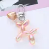 Pequeno Pingente de Cachorro de Balão Fresco Capa de Fone de Ouvido Decoração de Bolsa Acessórios Livro Vermelho Pequeno Amor Chaveiro Fashion Versátil