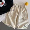 Pantalones para Niños 2026 Otoño Nuevo Bordado de Dibujos Animados Casual Elegante para Niños Versátil Holgado Versión Coreana Pantalones Largos