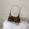 Bolso de Mano de Felpa y Gamuza Estilo Retro Coreano de Nicho Transfronterizo para Mujer 2026 Nuevo Estilo Bolso de Hombro Cruzado para el Viaje Diario